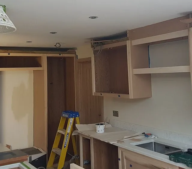a customers kitchen being painted